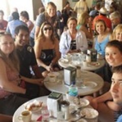 a group of people sitting at a table