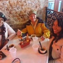 a group of people sitting at a table