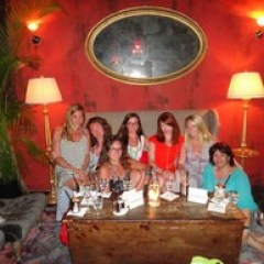 a group of people sitting at a table