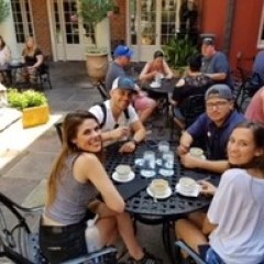 a group of people sitting at a table