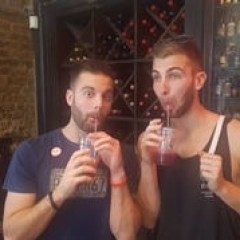 a man standing in front of a mirror posing for the camera