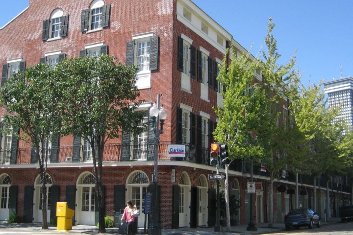 a close up of a street in front of a brick building