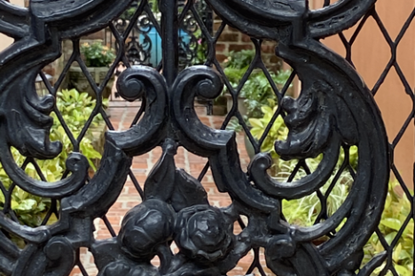 a large wooden bench in a park