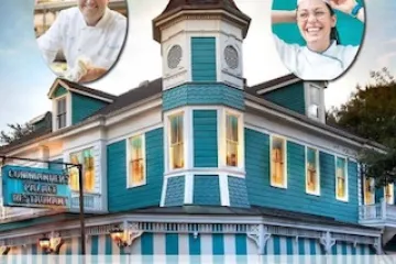 a sign in front of a building