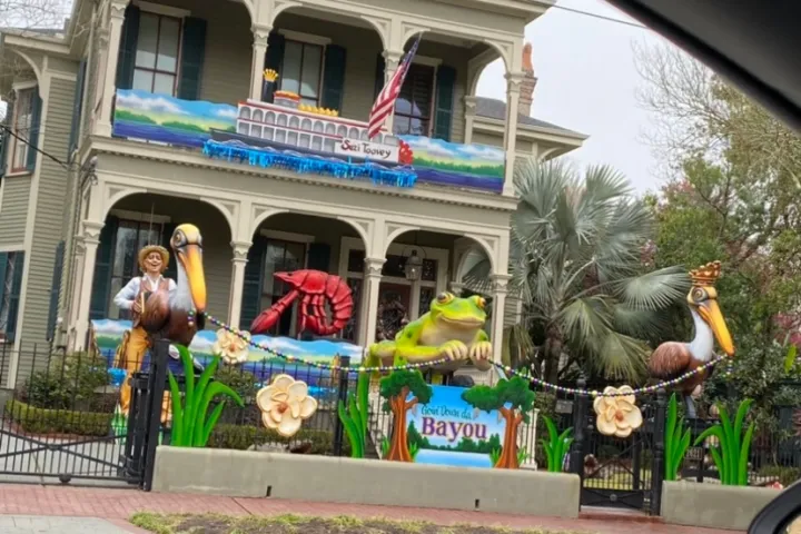 a group of people standing in front of a building