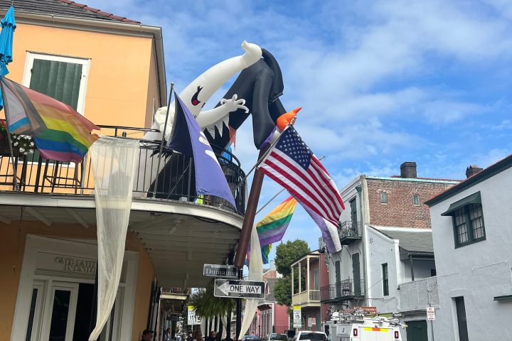 a group of people standing in front of a building