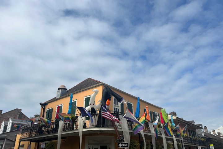 a group of people standing in front of a building