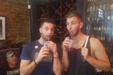 a person standing in front of a mirror posing for the camera
