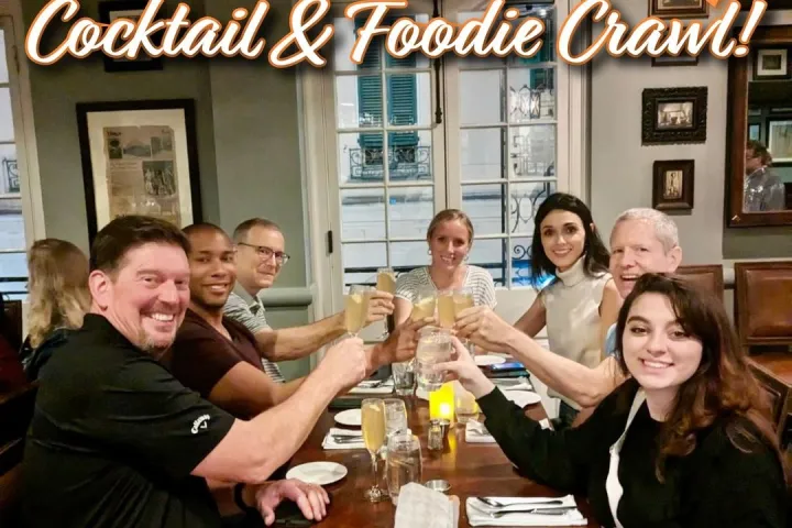a group of people sitting at a table in a restaurant