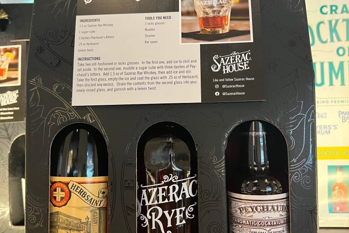 Sazerac cocktail kit with three bottles and recipe card in a black packaging box.